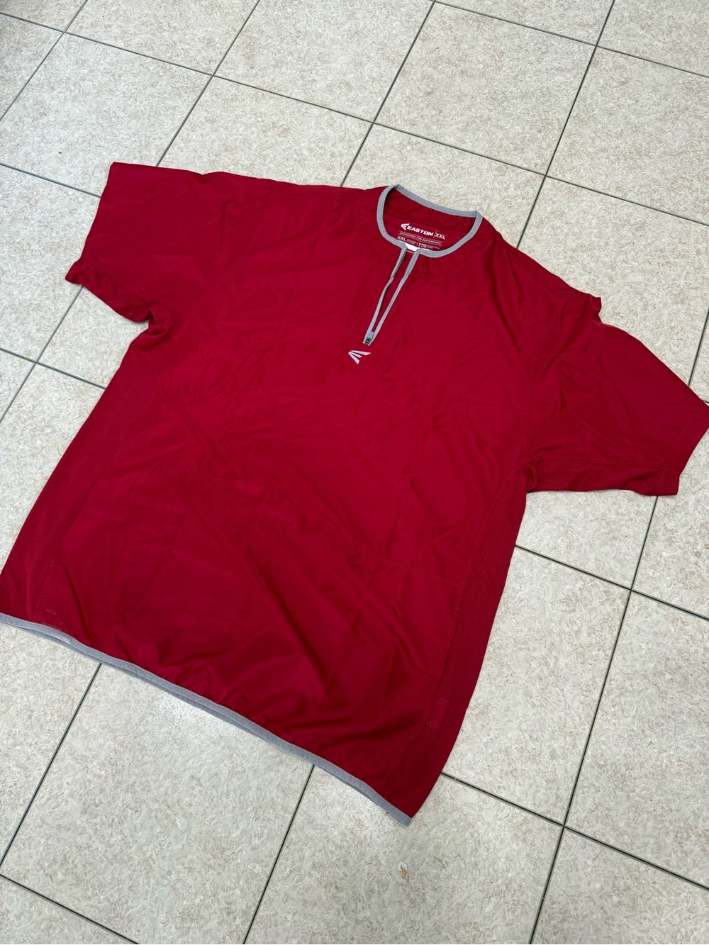 Easton Men's Red Alpha 1/4 zip cage jacket.